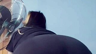 bbw yoga instructor stretches in tight shorts