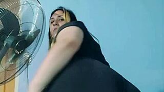 bbw yoga instructor stretches in tight shorts