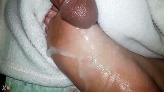 cumshot on oiled feet looks amazing