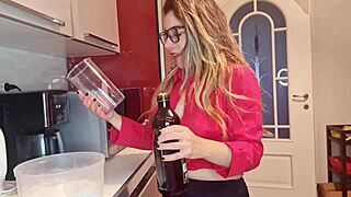 This slut in the kitchen masturbates and pays for her natural tits.