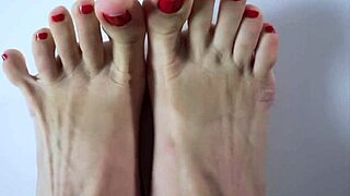 Close-up foot massage with lotion and snack