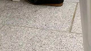 she teases with shoeplay, dipping tan nylons and flats in a fetish scene