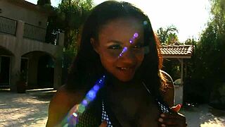 Blondes kissing in interracial scene