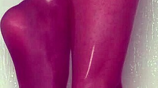 i'm teasing my nylon feet in the wet shower, they're so slippery