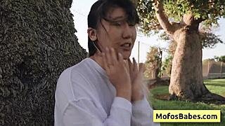 Asian Teen Reveals Natural Big Boobs Outdoors with Friend