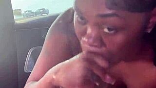 pretty black girl sucking dick sloppy by the lake, spitting and licking balls