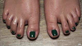 a close up of my toes with green nails for your fetish