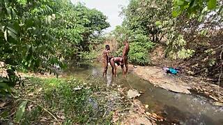 Curvy brown skinned ebony woman flashing and ready to be devoured at the outdoor stream