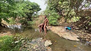 Curvy brown skinned ebony woman flashing and ready to be devoured at the outdoor stream