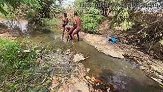 Curvy brown skinned ebony woman flashing and ready to be devoured at the outdoor stream