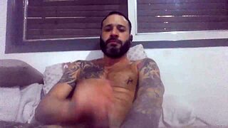 jerk till burst with pierced nipples and tattoos