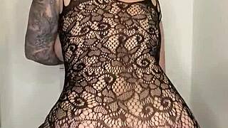 paige rocks fishnets while slamming that huge black cock dildo and swallows deep