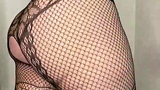 paige rocks fishnets while slamming that huge black cock dildo and swallows deep