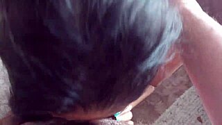 Amateur couple enjoys intimate fireplace moments in a cozy Mexican setting