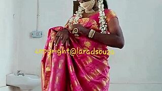 Indian crossdresser Lara Dsouza in saree—oh, watch her model and tease with that shemale allure!