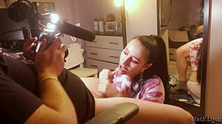 Behind the scenes, stunning cocksucker Black Lynn vapes while delivering an epic blowjob and handjob