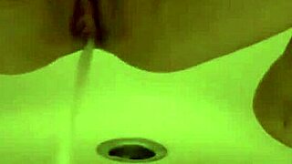 Striking Stunner Gets Her Wet Muff Filled with Warm Pee and Blasts Out Squirts