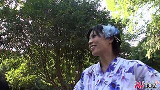 Brunette Japanese Saki Aoyama with big natural tits gives outdoor blowjob and handjob uncensored