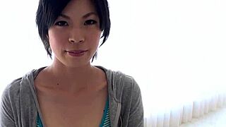 Brunette Japanese Saki Aoyama with big natural tits gives outdoor blowjob and handjob uncensored