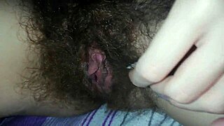 quick masturbation on my hairy pussy in bed, close up of big clit cumming