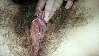 Hey, check out this closeup of my hairy pussy with big clit dripping wet grool