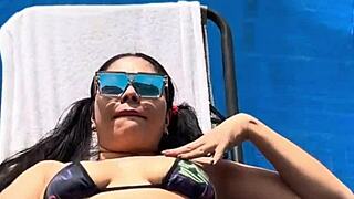 outdoor fun in the public pool with intriguing solo play and teasing flashes by the water