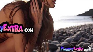 Skinny natural Russian Taya Vais relaxes naked on beach sand