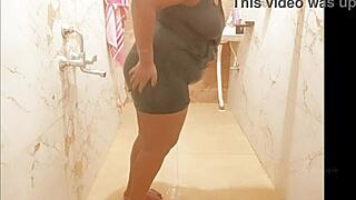 Myanmar milf slips into the shower, her curves glistening under the water in a steamy display