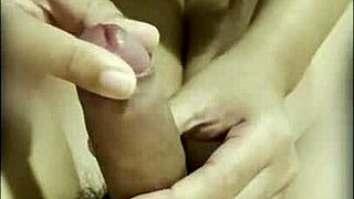 Keep stroking that small cock after cumshot, says Asian Thai teen giving boyfriend handjob in bedroom