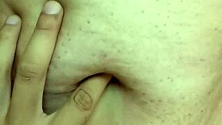 Detailed exploration of a milf's navel during massage