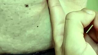 Detailed exploration of a milf's navel during massage