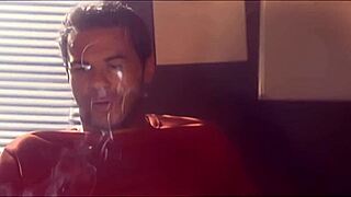 The slutty brunette is fucking in high heels on the bed