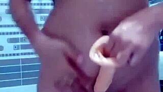 Pakistani stepmom in bathroom with toy