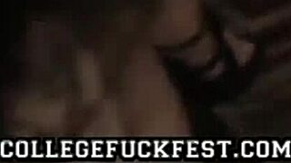 lesbian couple uses toys while friends watch at the outdoor party