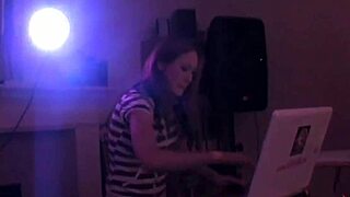 lesbian couple uses toys while friends watch at the outdoor party