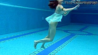 Exciting underwater swim with babe lizi vogue in the pool, showcasing her skills and beauty