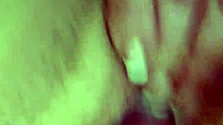 she plays with a big dildo, feeling every inch