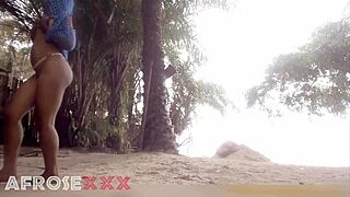 Black girl teasing on the beach 😏