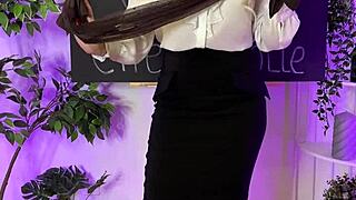 in the nylon club, a sexy mature blonde slowly puts on her coffee colored tights, teasing with her curves