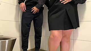 Juicy milf wanks cock in public toilet