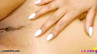 Captivating brunette model shows her body