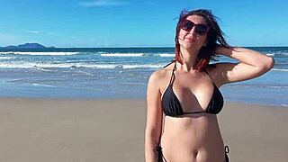 That Beach Walk Turns Voyeuristic with Big Tits Exposed