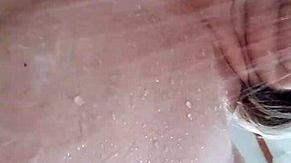 A housewife takes a relaxing shower and captures a selfie for her fans