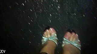 walking in the rain with sexy stilettos and nylons, getting wet and naked