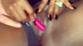 sexy black model masturbates with vibrator for white guy, her shaved pussy wet and tight