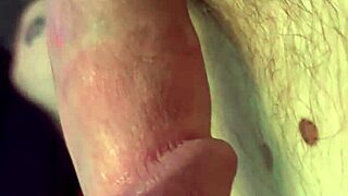 An amateur babe delivers a close-up handjob on a monster cock