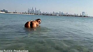 Monika fox swims naked in sea and walks along beach free