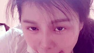 bound woman receives blowjob while feet are licked and sucked