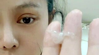 bound woman receives blowjob while feet are licked and sucked