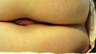 Amateur brunette milf performs anal fisting on her shaved pussy with close-up orgasm